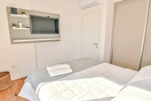 1 chambre, fer et planche à repasser, Wi-Fi, draps fournis