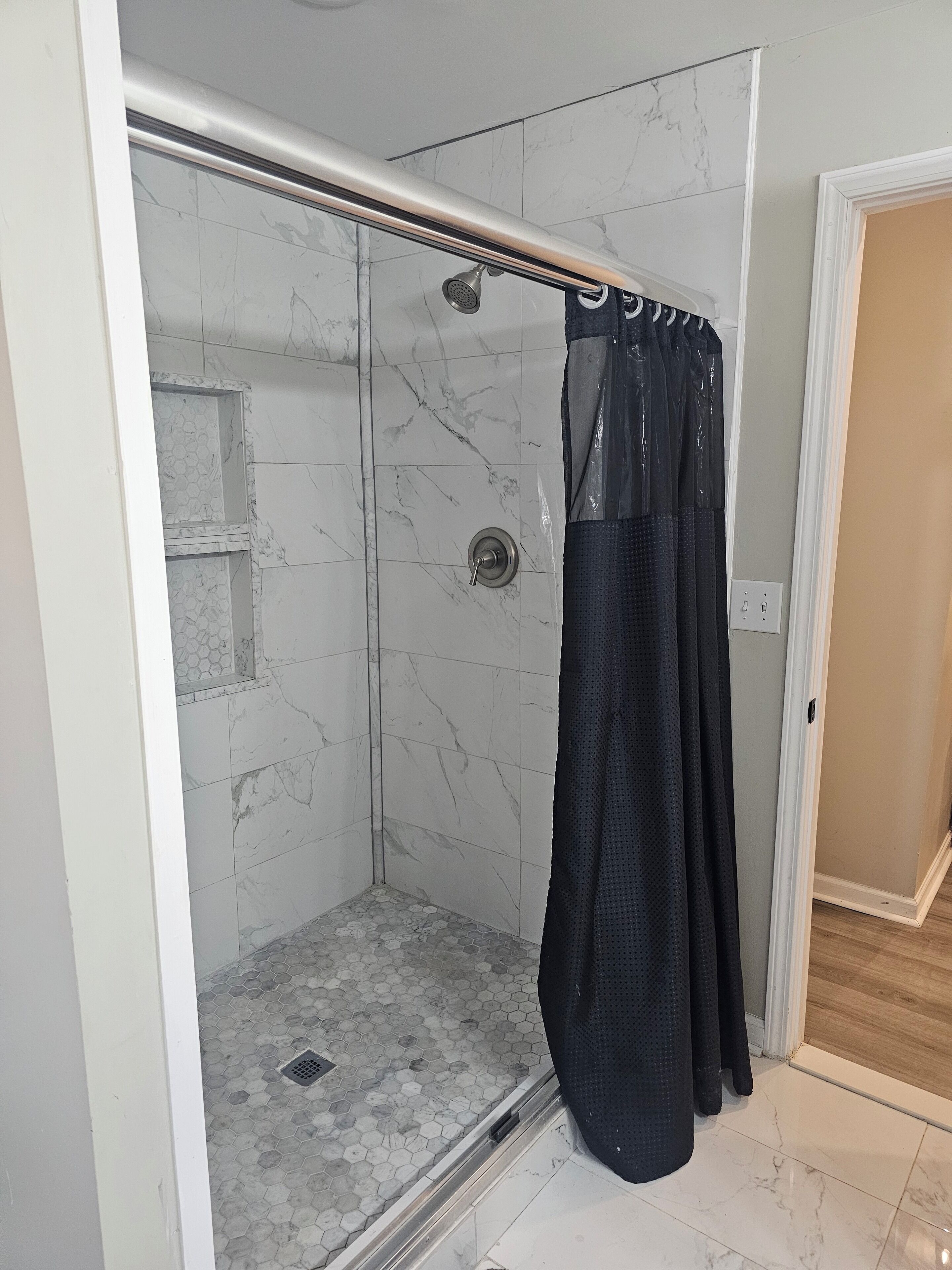 Shower, towels, soap, toilet paper