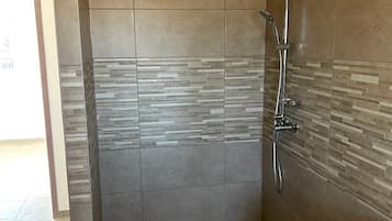 Shower, towels, soap, shampoo