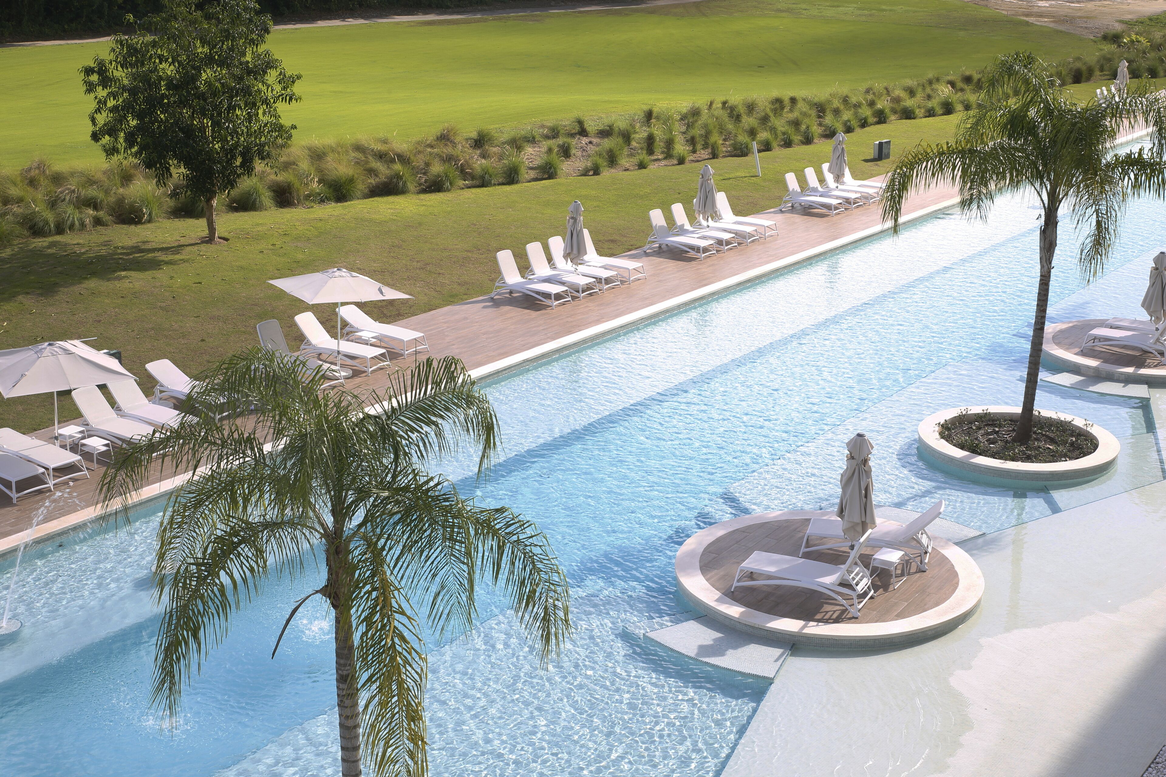 2 outdoor pools, pool umbrellas, sun loungers