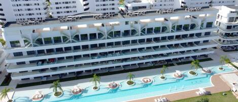 2 outdoor pools, pool umbrellas, sun loungers