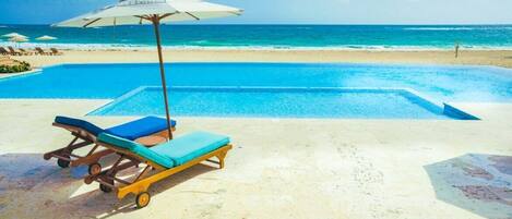 Private beach, white sand, beach cabanas, sun-loungers