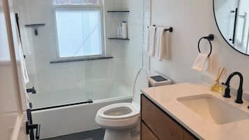 Hair dryer, towels, soap, shampoo