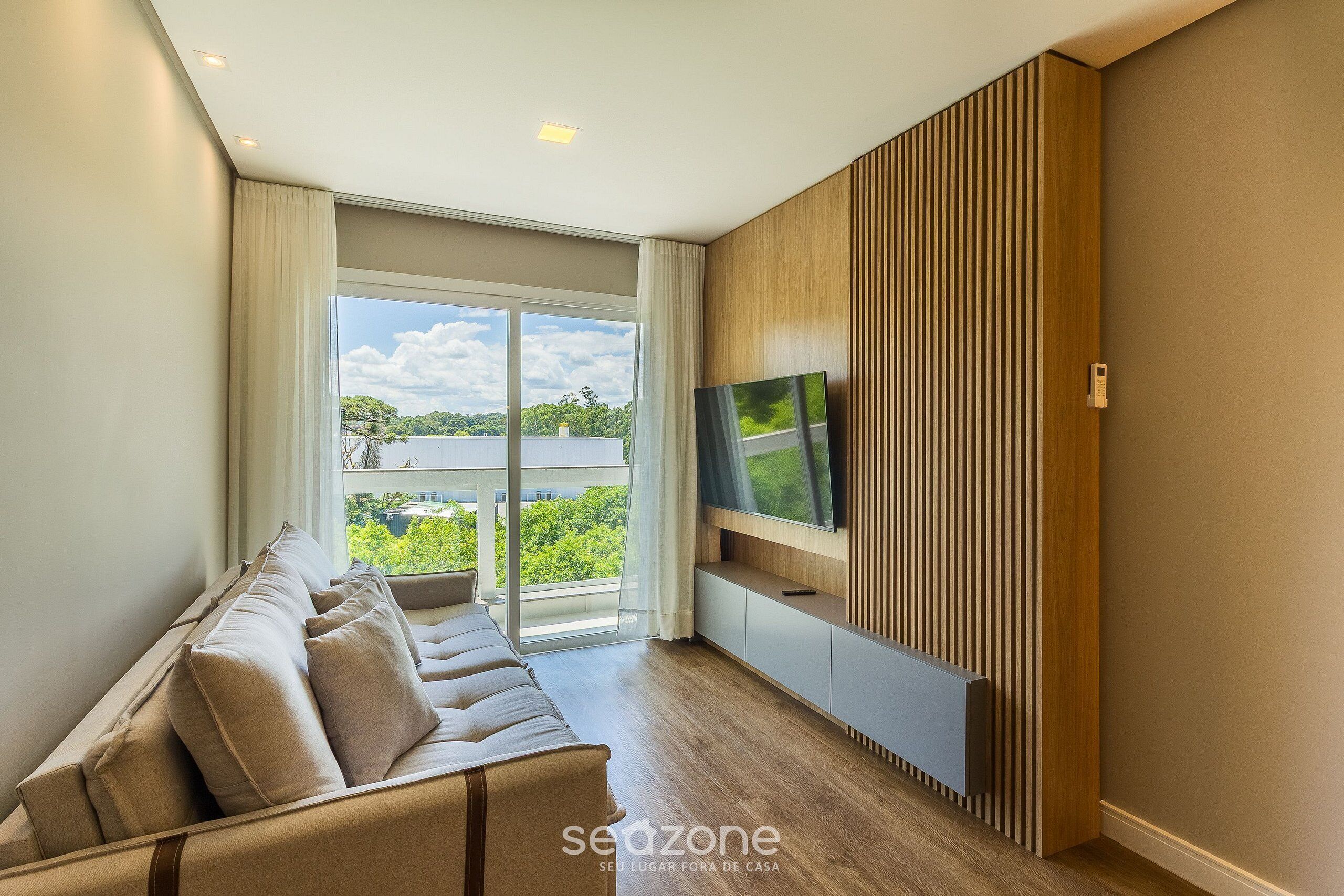 Basic Apartment | Living area | 40-inch TV with digital channels