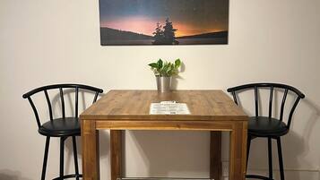 Basic Double Room, 2 Queen Beds | Dining | Lunch and dinner served