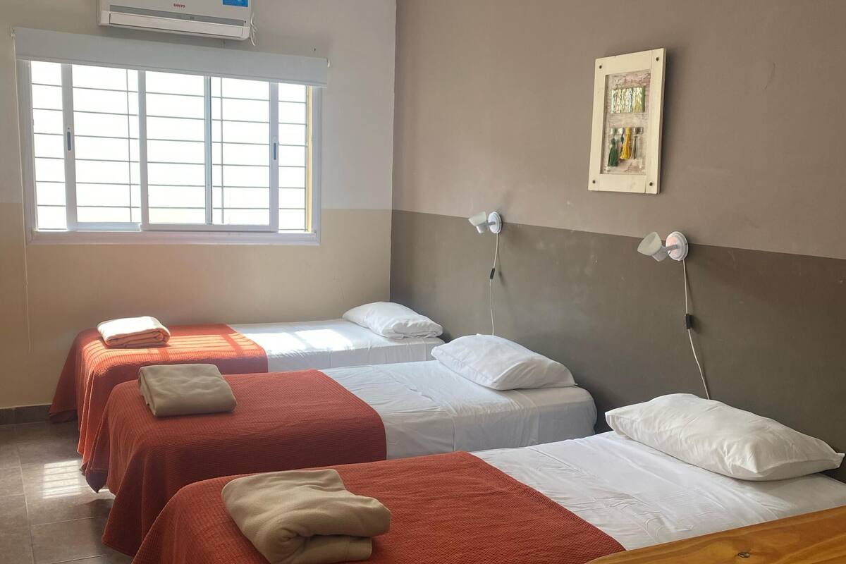 Basic Triple Room, Courtyard View | In-room safe, laptop workspace, free WiFi