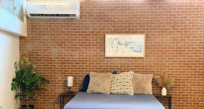 Studio with AC in vibrant Ponce near beach, downtown, airport and highway.