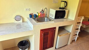 Fridge, microwave, cookware/dishes/utensils