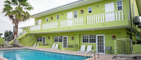 Deluxe Apartment, 2 Queen Beds, Non Smoking, Pool View | Pool | Outdoor pool, sun loungers