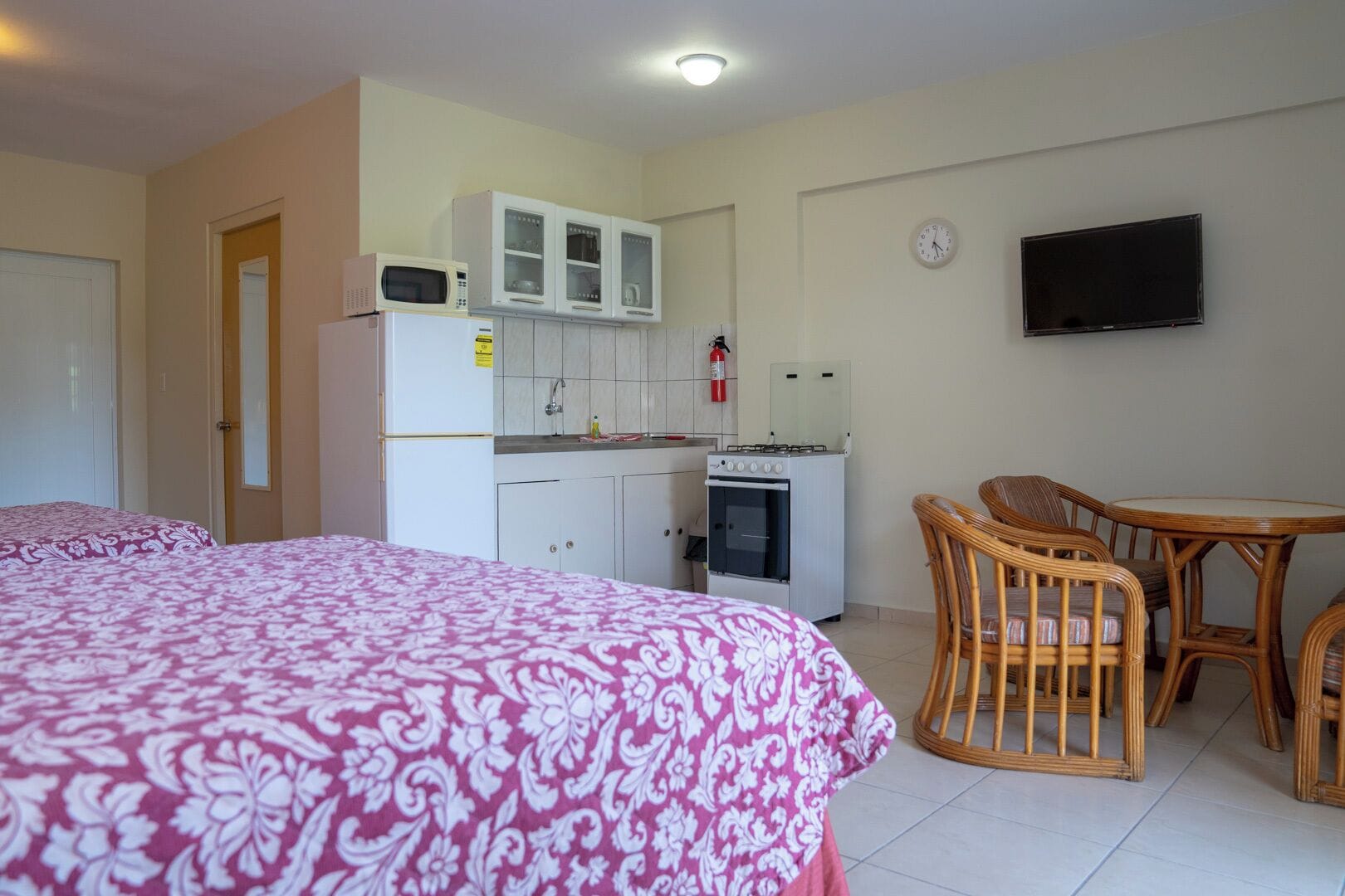 Deluxe Apartment, 2 Queen Beds, Non Smoking, Pool View | Laptop workspace, iron/ironing board, free WiFi, bed sheets
