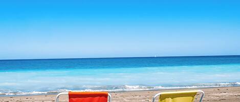 Beach nearby, sun-loungers, beach towels