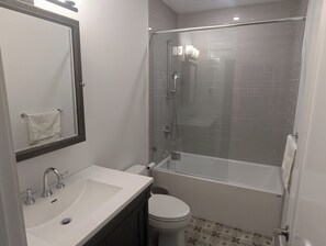 Shower, hair dryer, towels, soap - Urban Forest 2 Bedroom+ suite in Mid Century Architect's Home (Victoria)