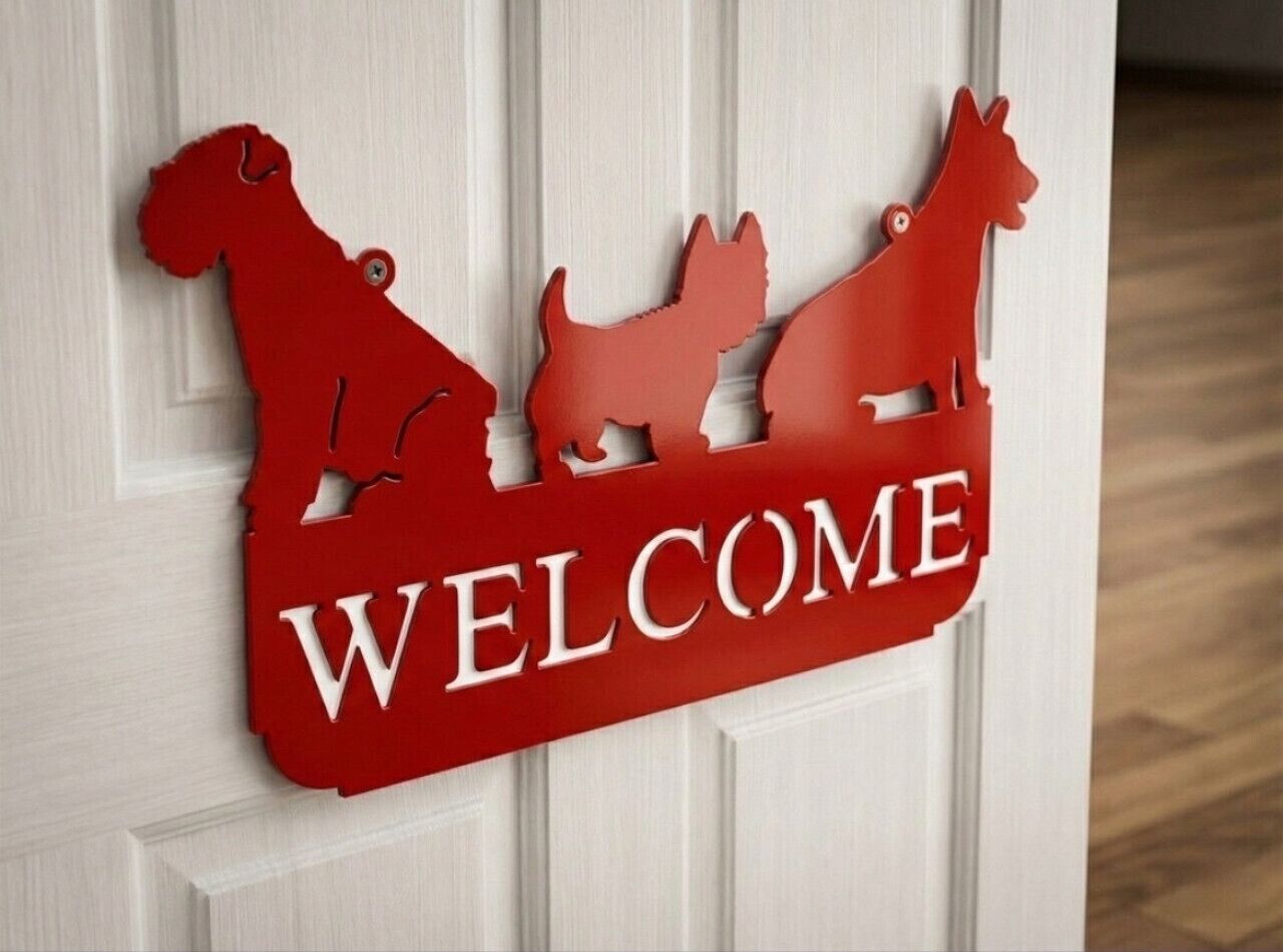 A red welcome sign with silhouettes of a dog, cat, and horse.