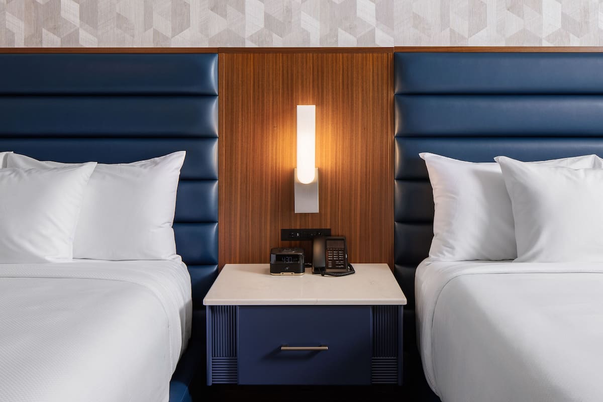 Deluxe Room, 2 Queen Beds | In-room safe, desk, rollaway beds, bed sheets