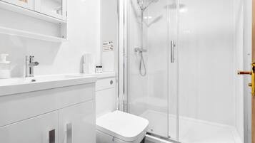Shower, hair dryer, shampoo