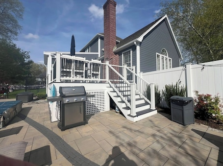 Terrace/patio. Perfect World Cup Getaway – Close to Stadium & Pool, Grill & Gym included!