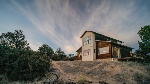 A modern two-story house with a large glass window on the ground floor, surrounded by natural landscape. - Unbeatable 🏔️  Views, Serene, Fall Foliage, Hike, ATV Access (South Fork)