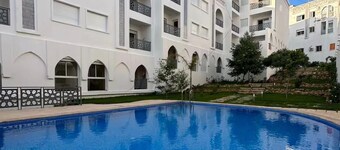 Stunning Sea & Pool View Stylish 2BR Retreat
With 2 balconies