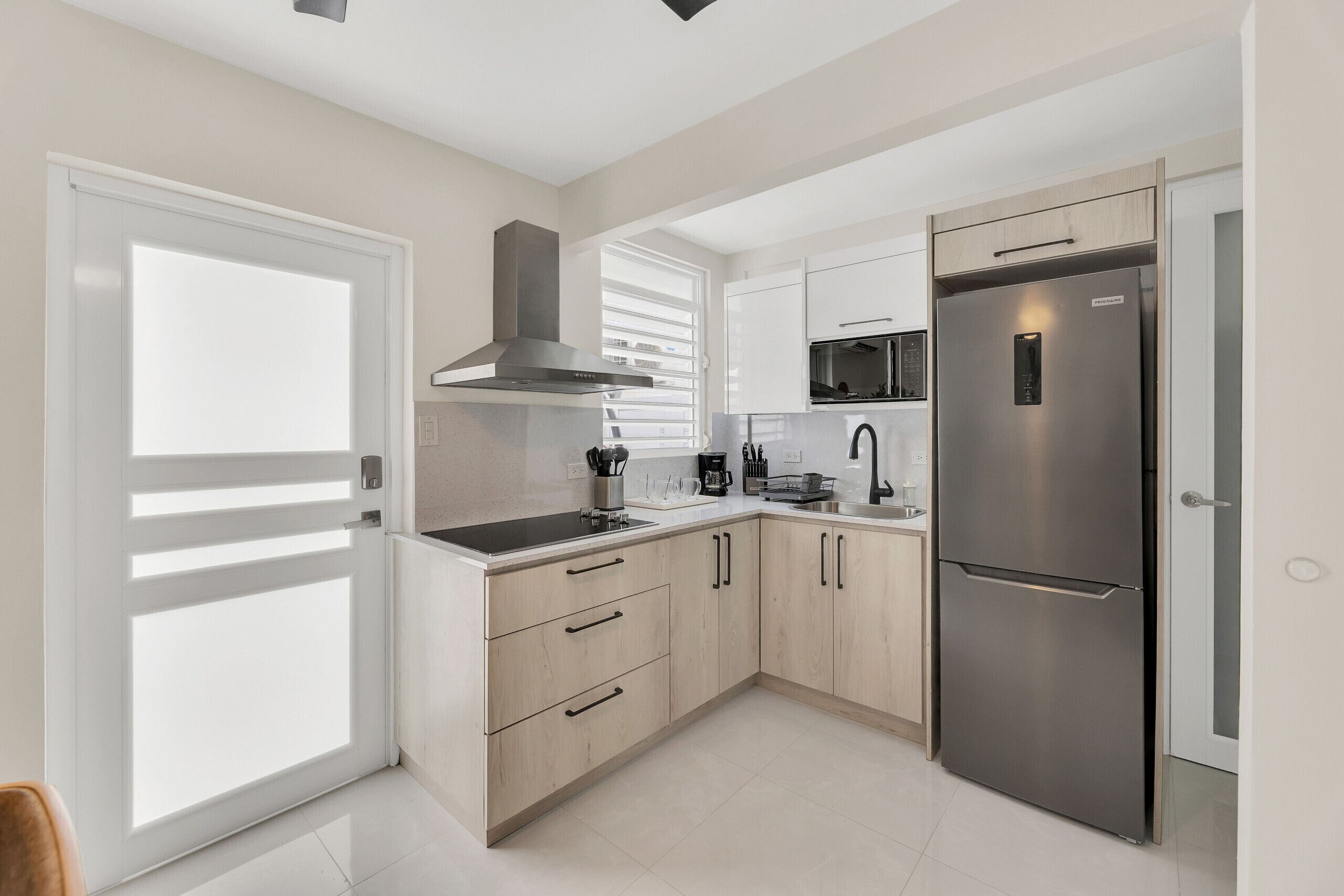 Fridge, microwave, stovetop, coffee/tea maker
