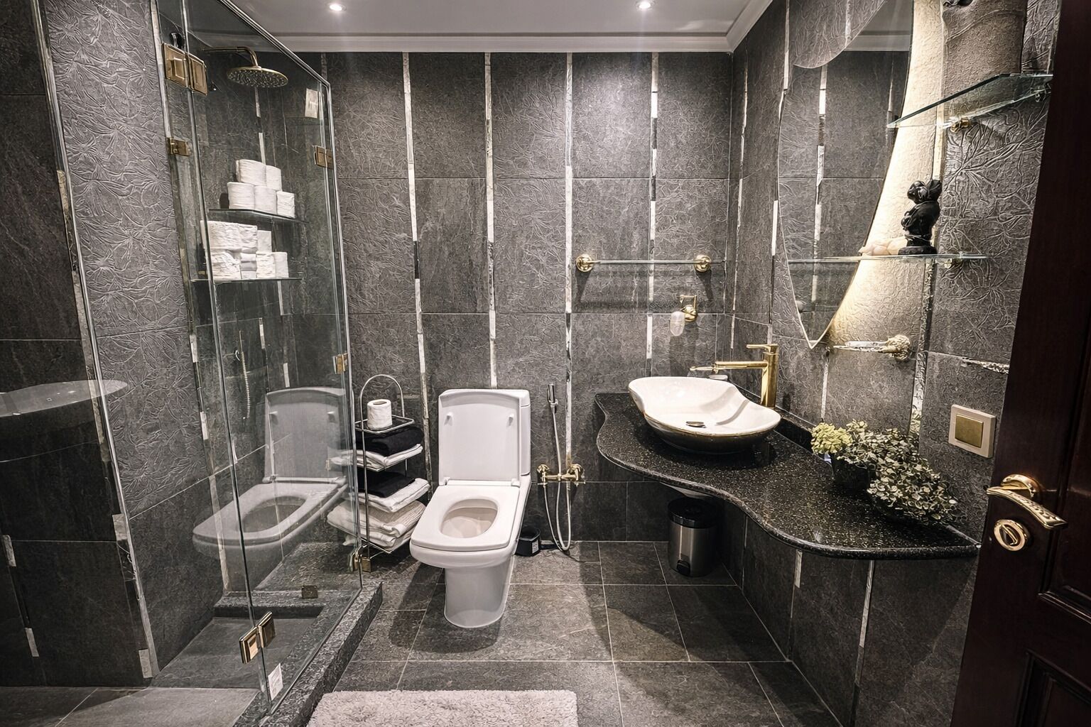 Shower, hair dryer, towels, toilet paper