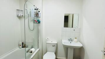 Jetted bath, towels, soap, toilet paper