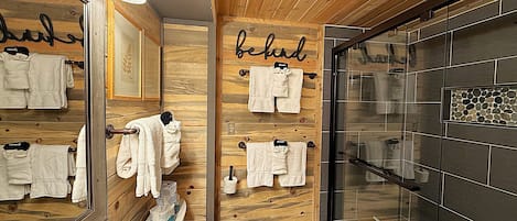 Shower, hair dryer, towels