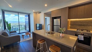 Fridge, microwave, oven, stovetop - River View High-Rise 1BR Apartment by GC Casino (Broadbeach)