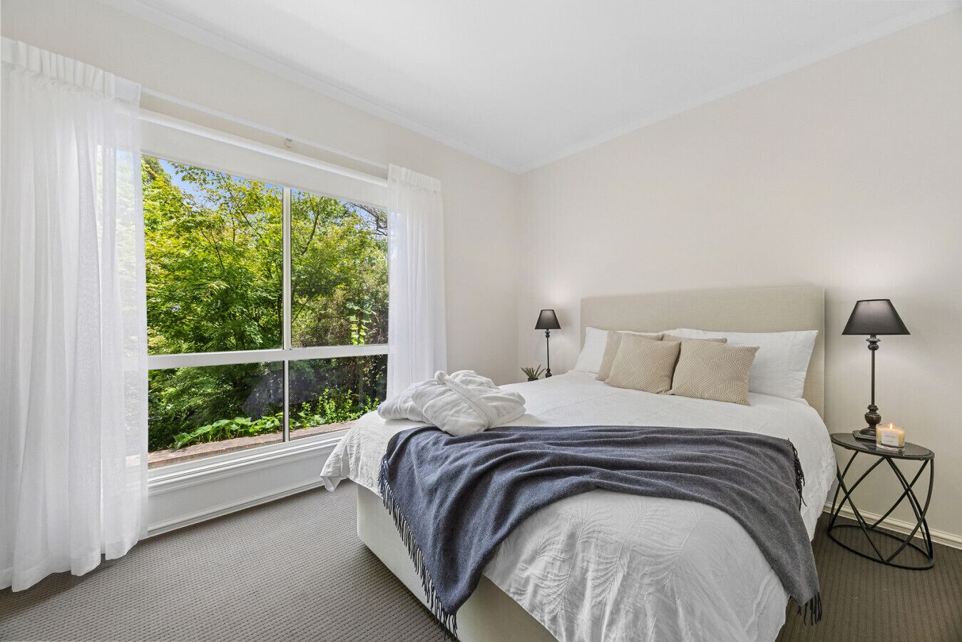 Bedroom with queen bed and high-quality linen