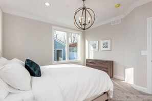 Desk, laptop workspace, blackout curtains, iron/ironing board - Luxury Modern Harrison West Townhome (Columbus)