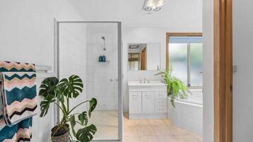 Jetted bath, hair dryer, towels, soap