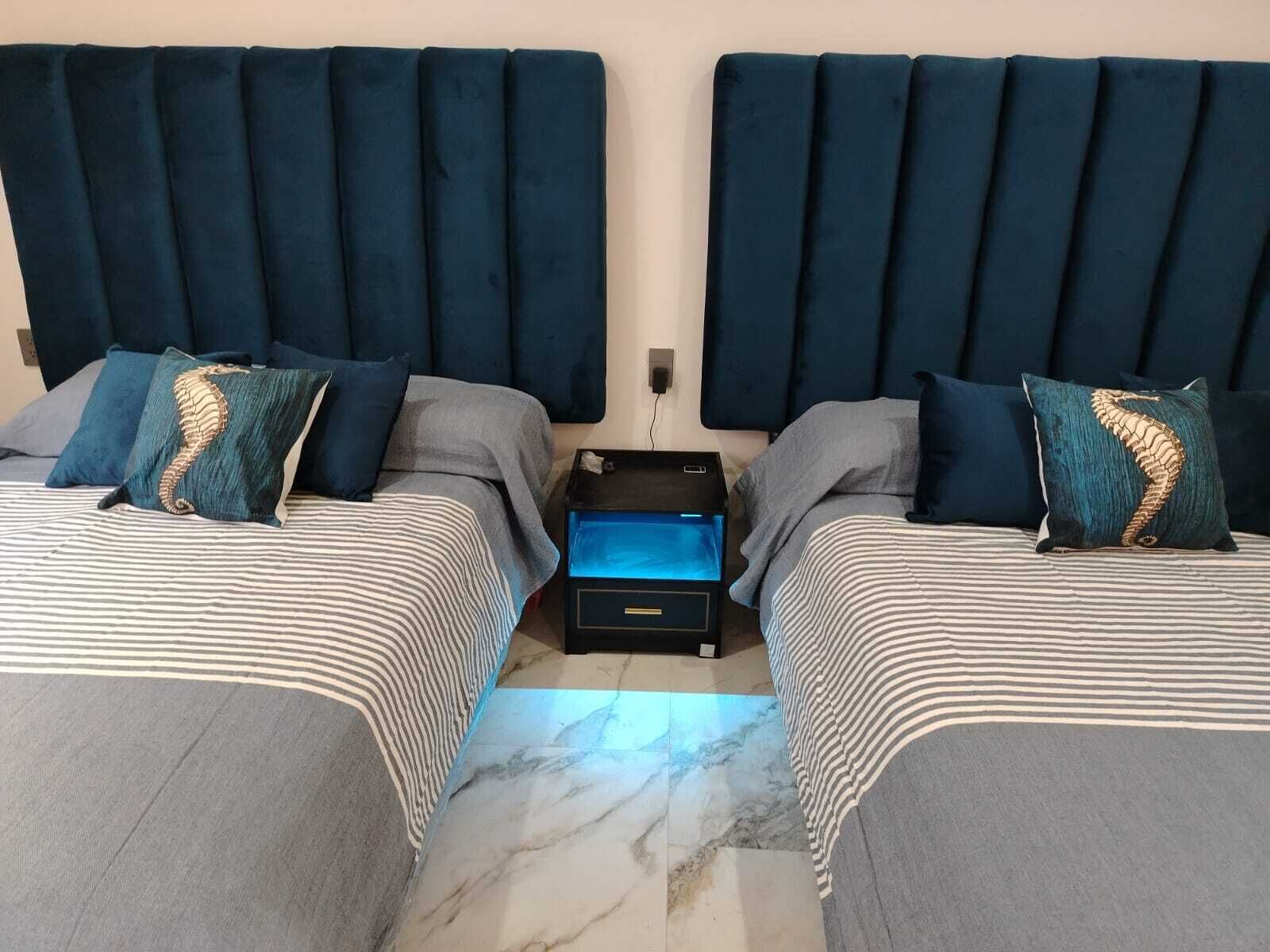 Mörkläggningsgardiner, ljudisolering och strykjärn/strykbräda