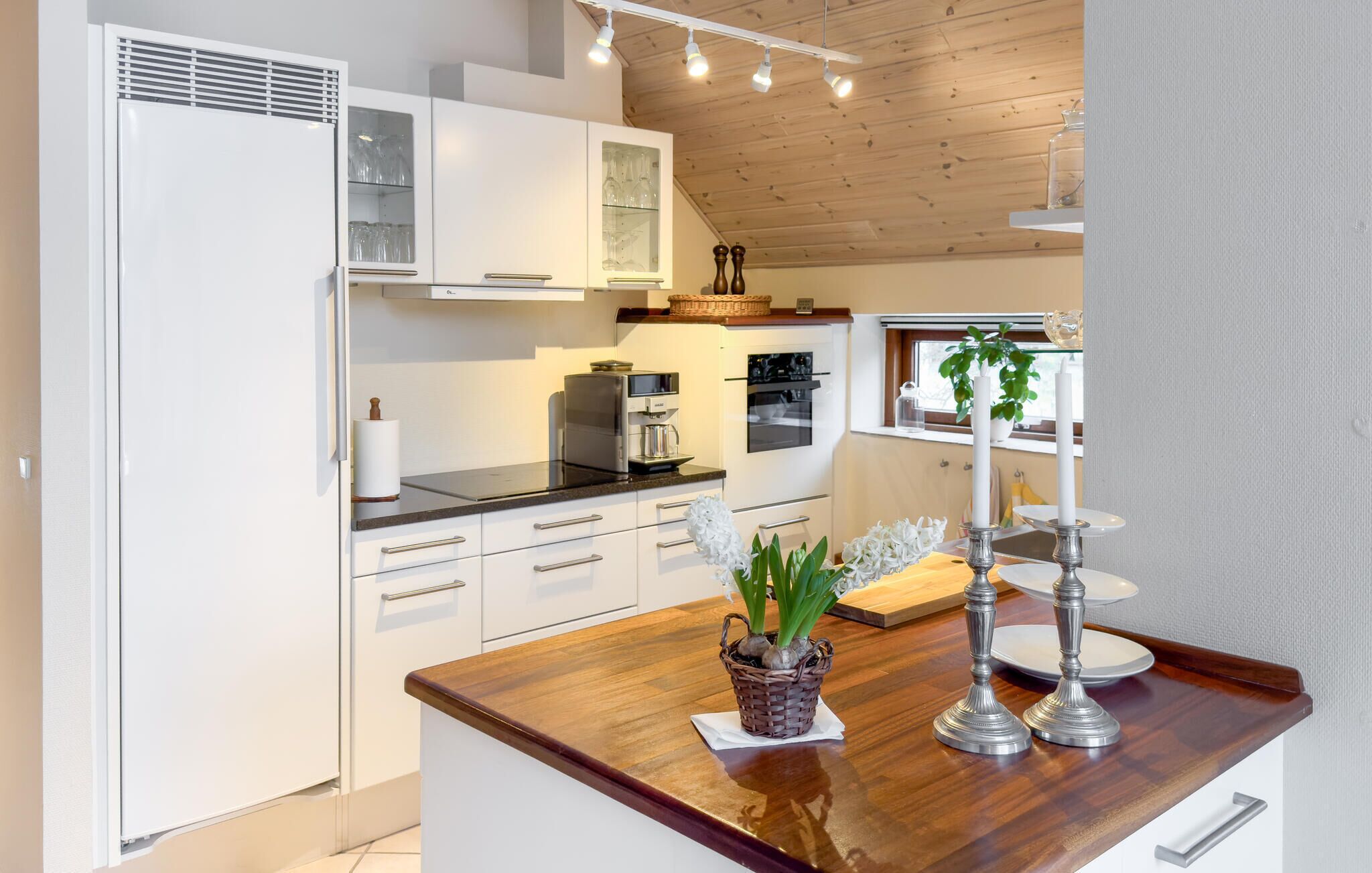 Fridge, dishwasher, coffee/tea maker, cookware/dishes/utensils