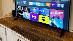 A flat-screen TV displaying a streaming interface with various content options. - Quiet, Private Home in Kingston Springs for Two (Kingston Springs)