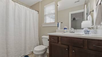 Hair dryer, towels, soap, toilet paper
