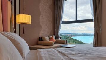 Deluxe Room, Sea View | Desk, laptop workspace, free WiFi