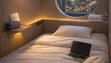 Desk, laptop workspace, free WiFi, bed sheets