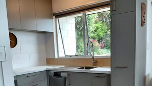 Coffee/tea maker, fridge, microwave, oven - Come Relax at Hilltop Nest Retreat with Ocean Views (Oamaru)