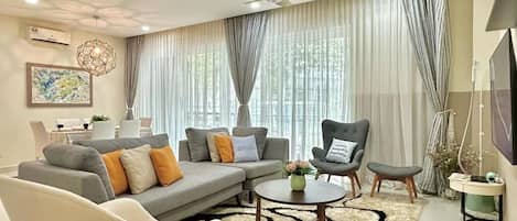 Luxury Apartment, 3 Bedrooms, Balcony, Pool View | Living area | TV