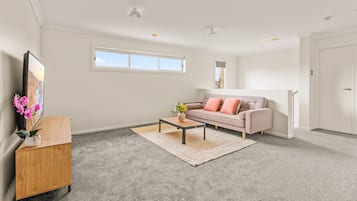 Maison Deluxe, vue jardin | Coin séjour