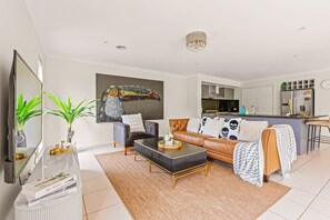 Maison Deluxe, vue jardin | Coin séjour