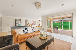 Deluxe huis, uitzicht op tuin | Woonruimte