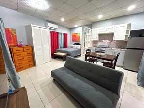 Living area - Modern Studio in Cascade, 5 Mins from Savannah (Port of Spain)