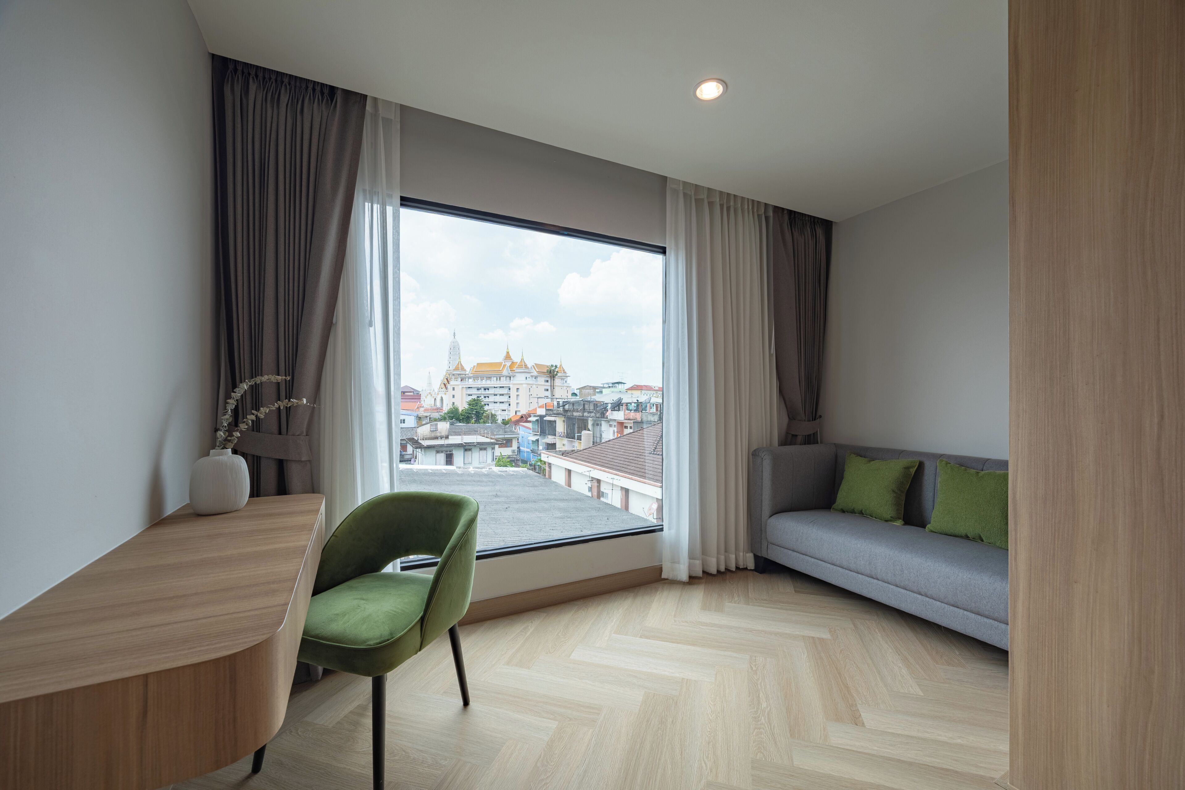 Premier Room, 1 King Bed, City View | In-room safe, laptop workspace, blackout drapes, soundproofing