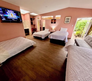 Family Shared Dormitory, Garden View | Desk, laptop workspace, free WiFi, wheelchair access - HOTEL CASA IRIS (Chía)