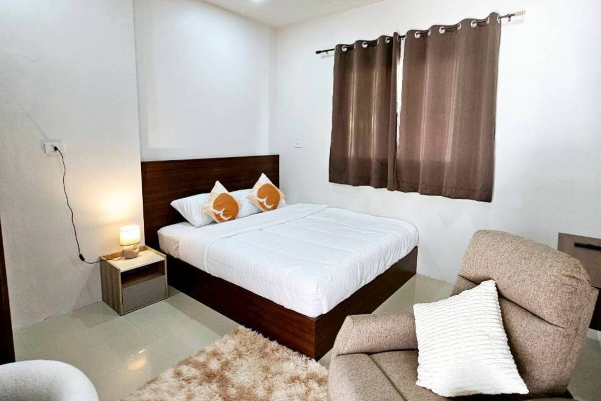 Quarto casal clássico, vista para a montanha