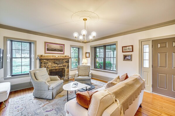 TV, fireplace, books