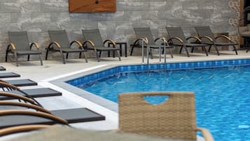 Indoor pool, open 10:00 AM to 10:00 PM, pool loungers