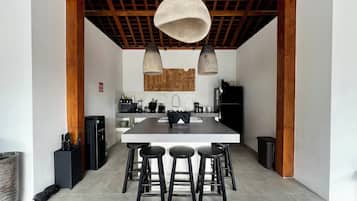 Deluxe Villa, Balcony, Pool View | Private kitchen | Coffee/tea maker, electric kettle, kitchen islands