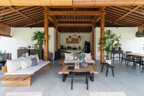 Deluxe Villa, Balcony, Pool View | Living area | 32-inch Smart TV with digital channels - Villa Sora by Alfred in Bali (Seminyak)