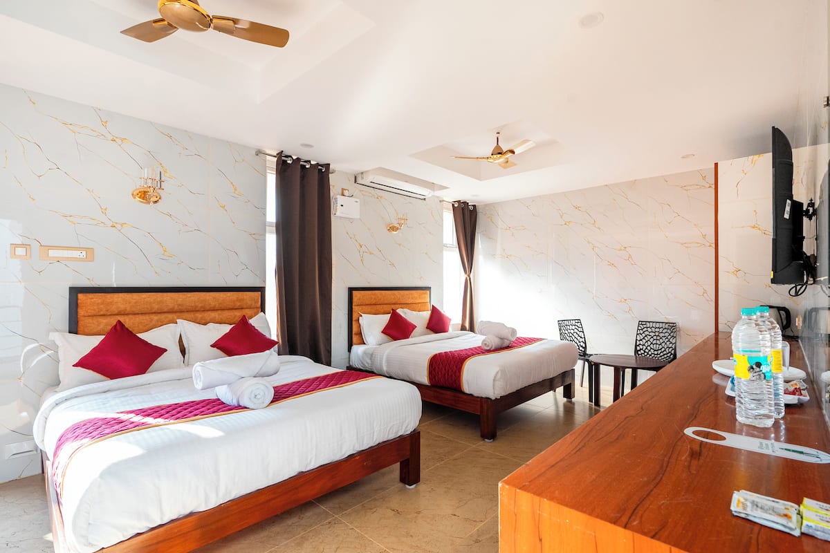 Economy Quadruple Room, Pool View | Desk, laptop workspace, free WiFi